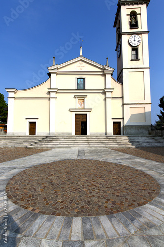 cadrezzate  in  the old   church  closed brick tower sidewalk it photo