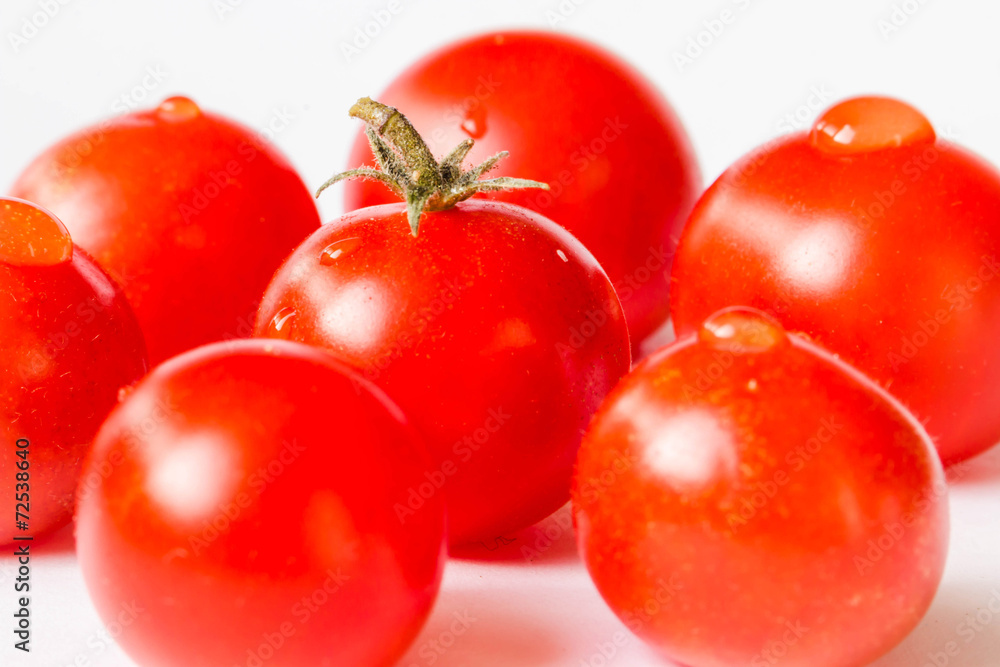 Cherry tomatoes isolated on white background Cherry tomatoes isolated on white background