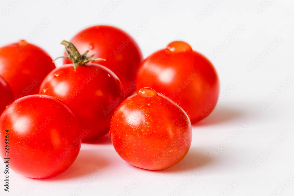 Cherry tomatoes isolated on white background Cherry tomatoes isolated on white background