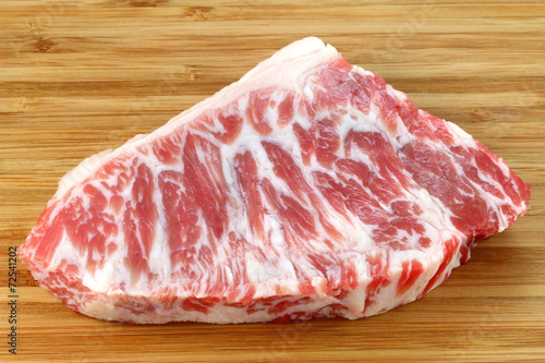 A piece of fresh and raw Beef hump photo