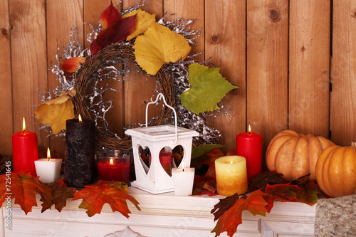 Fototapeta Naklejka Na Ścianę i Meble -  Festive autumn decor on fireplace