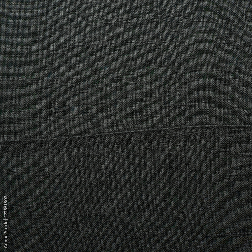 Fototapeta premium Black linen cloth fragment