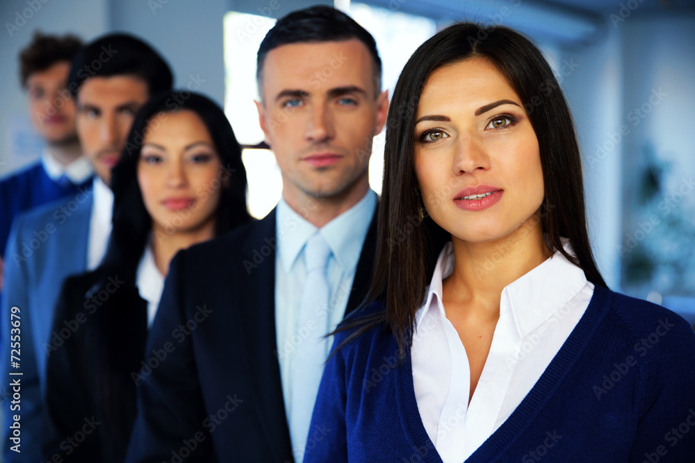Group of a young businesspeople looking at camera Group of a young businesspeople looking at camera