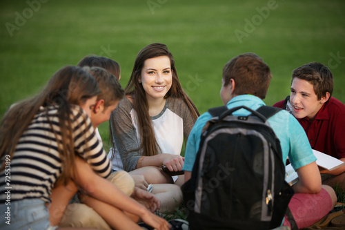 Girl Talking with Classmates