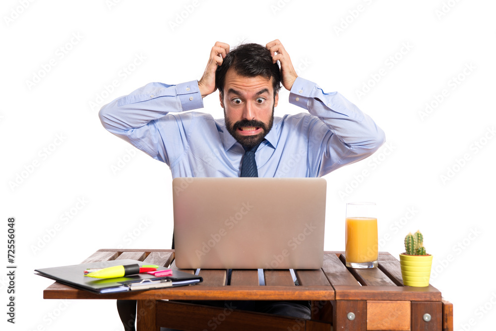 frustrated businessman over white background frustrated businessman over white background