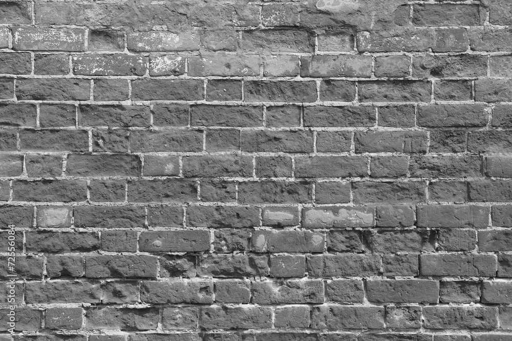 Fototapeta premium Old brick wall with dark bricks