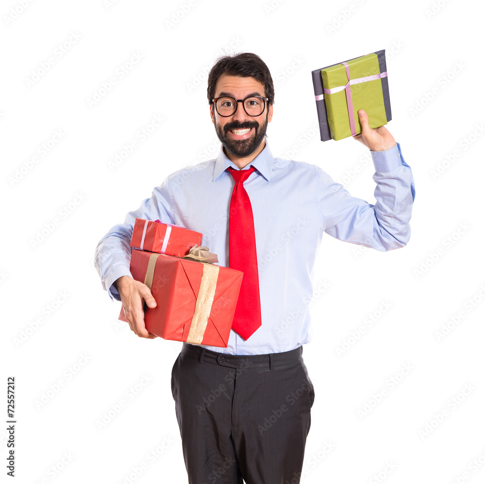 Businessman with gift over white Businessman with gift over white