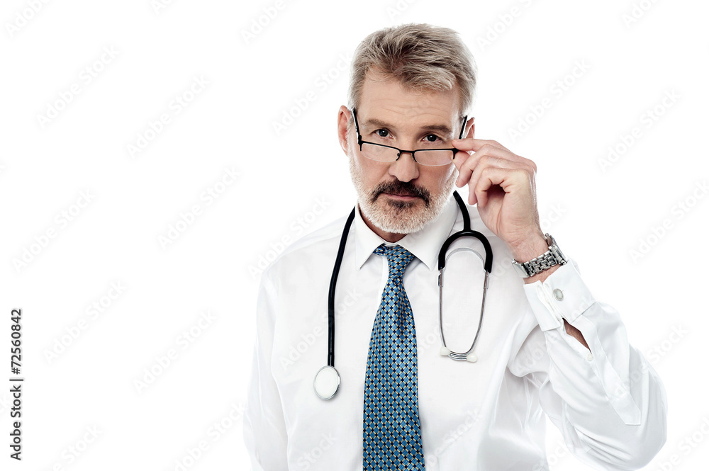 Experienced male doctor isolated over white Experienced male doctor isolated over white