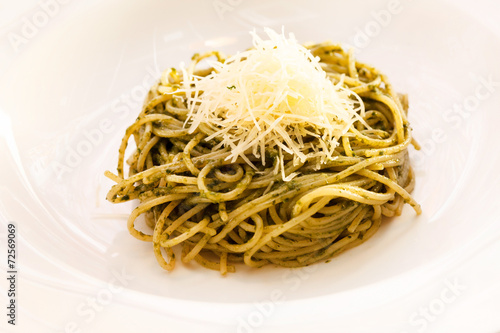 spaghetti mixed with pesto
