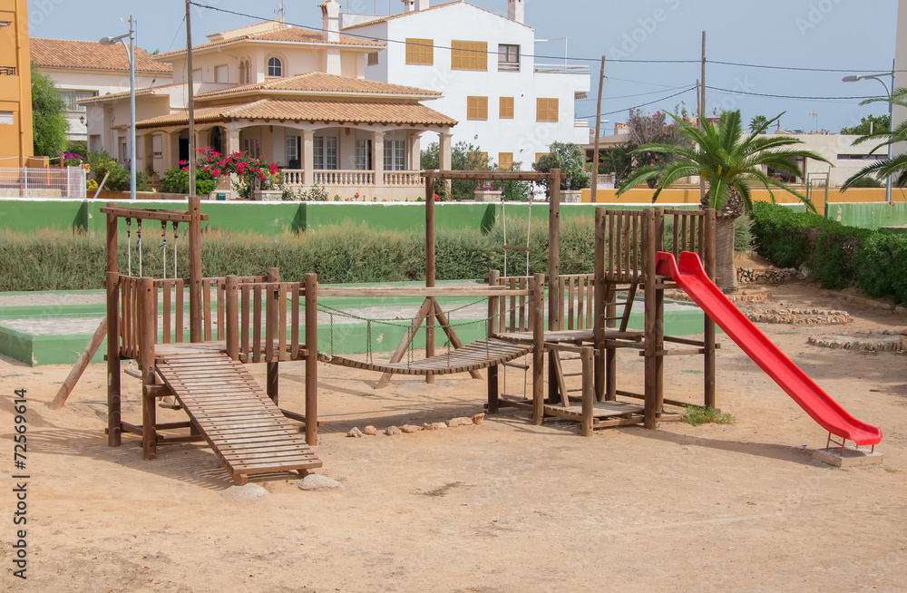 Modern children playground in city park. Modern children playground in city park.