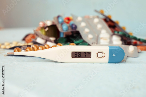 Close up of the medical thermometer in arm