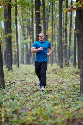 Man jogging in the forest