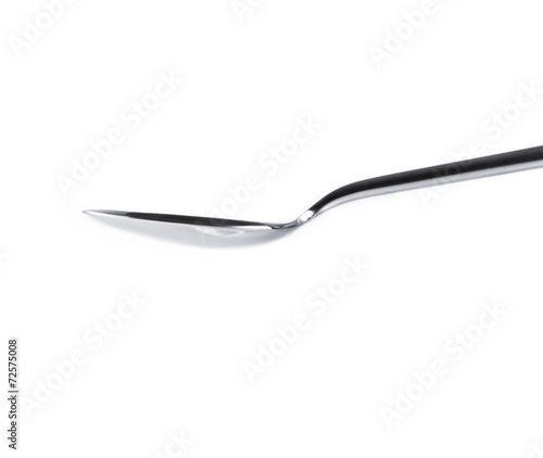 Empty spoon isolated on white background