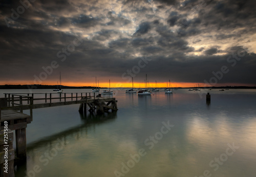 Sunset over Poole Harbour at Hamworthy pier