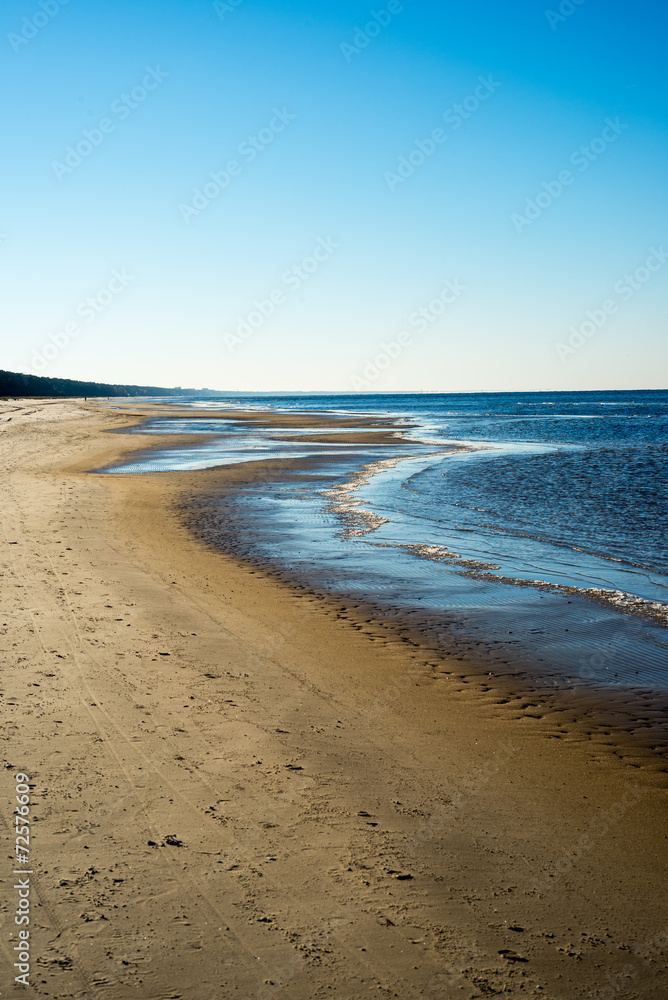 icy sea beach with first ice pieces icy sea beach with first ice pieces