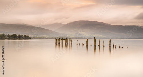 Loch Lomond jetty and mountains at sunset photo