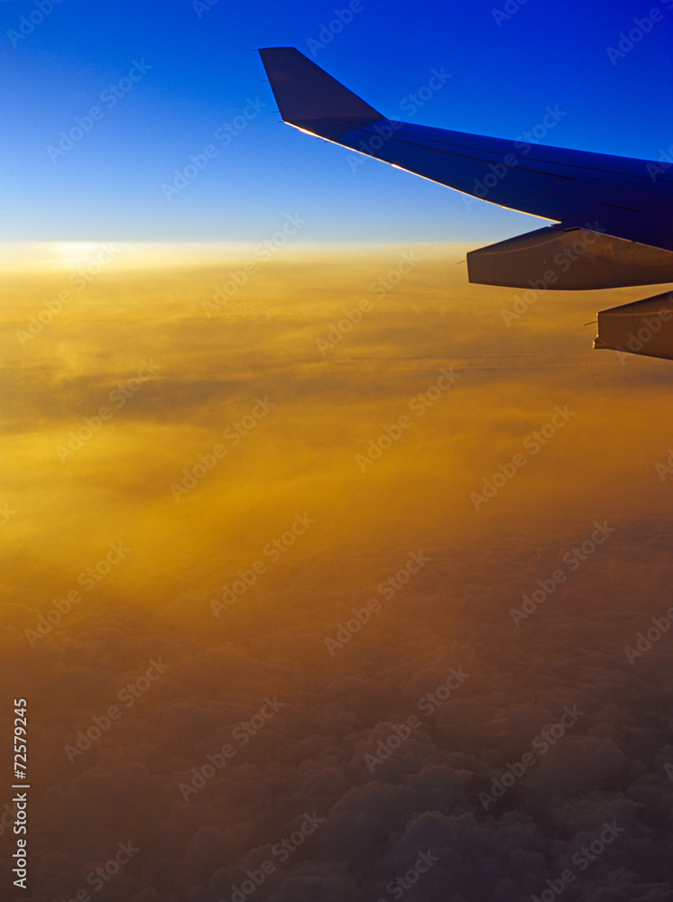 Fototapeta premium Sunset over a clouds.