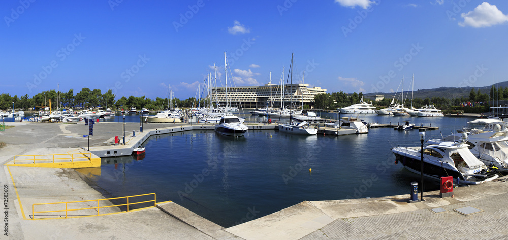 Panorama of boats in the private dock.