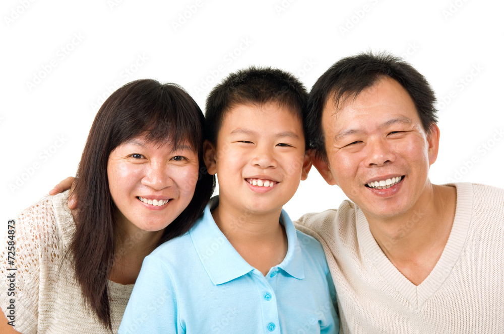 Indoor portrait of asian family isolated on white Indoor portrait of asian family isolated on white