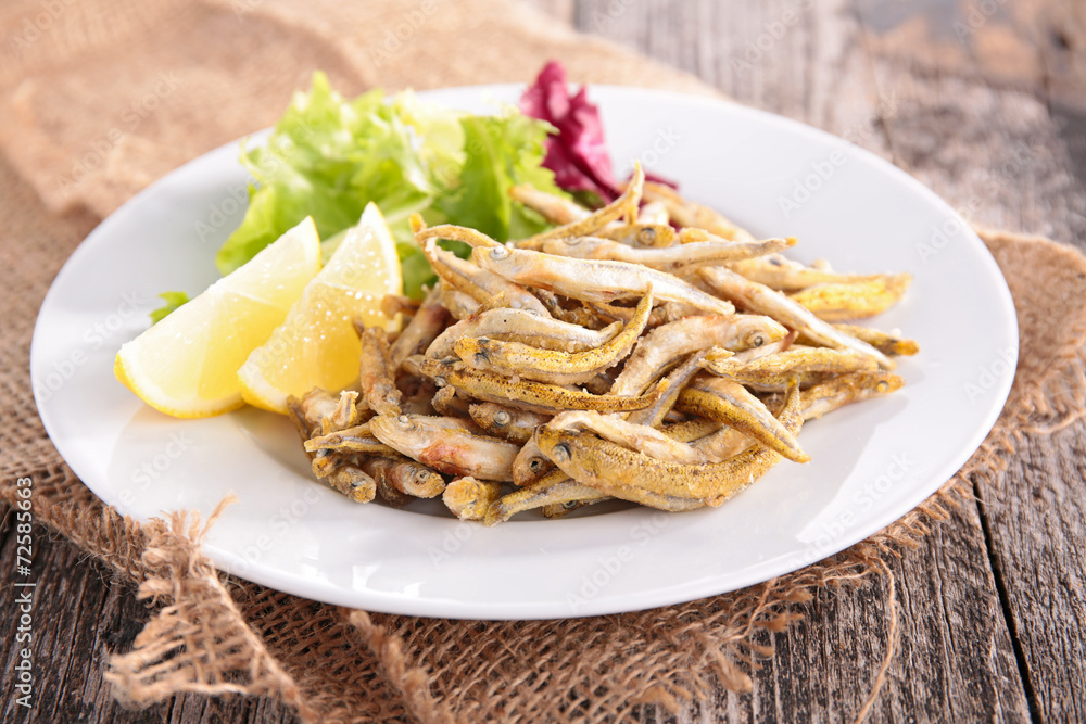 fried fish and salad