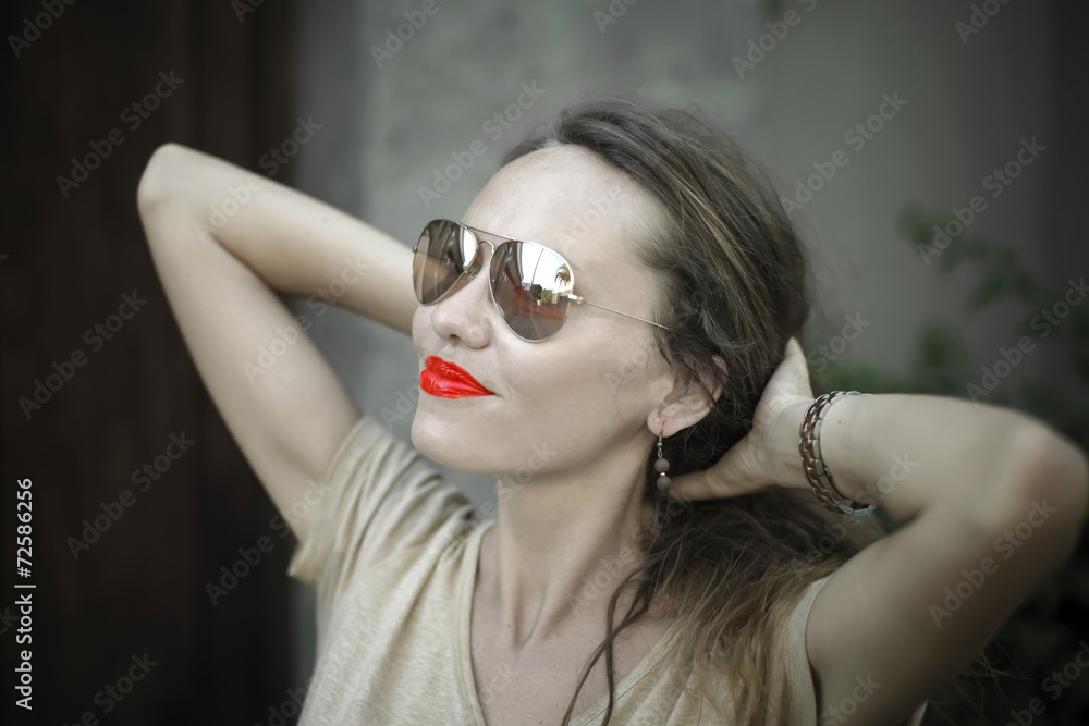 Monochrome portrait of young beautiful woman with red lipstick Monochrome portrait of young beautiful woman with red lipstick