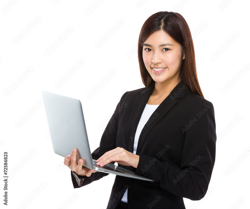 Business woman use of laptop computer Business woman use of laptop computer