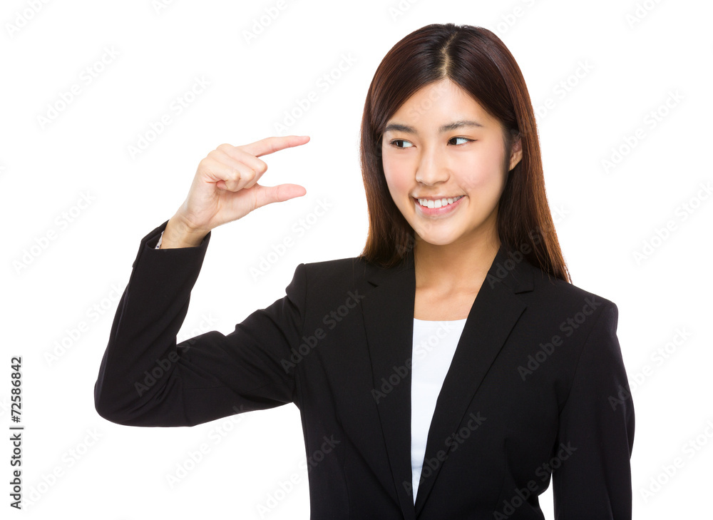 Businesswoman look at the finger gap Businesswoman look at the finger gap