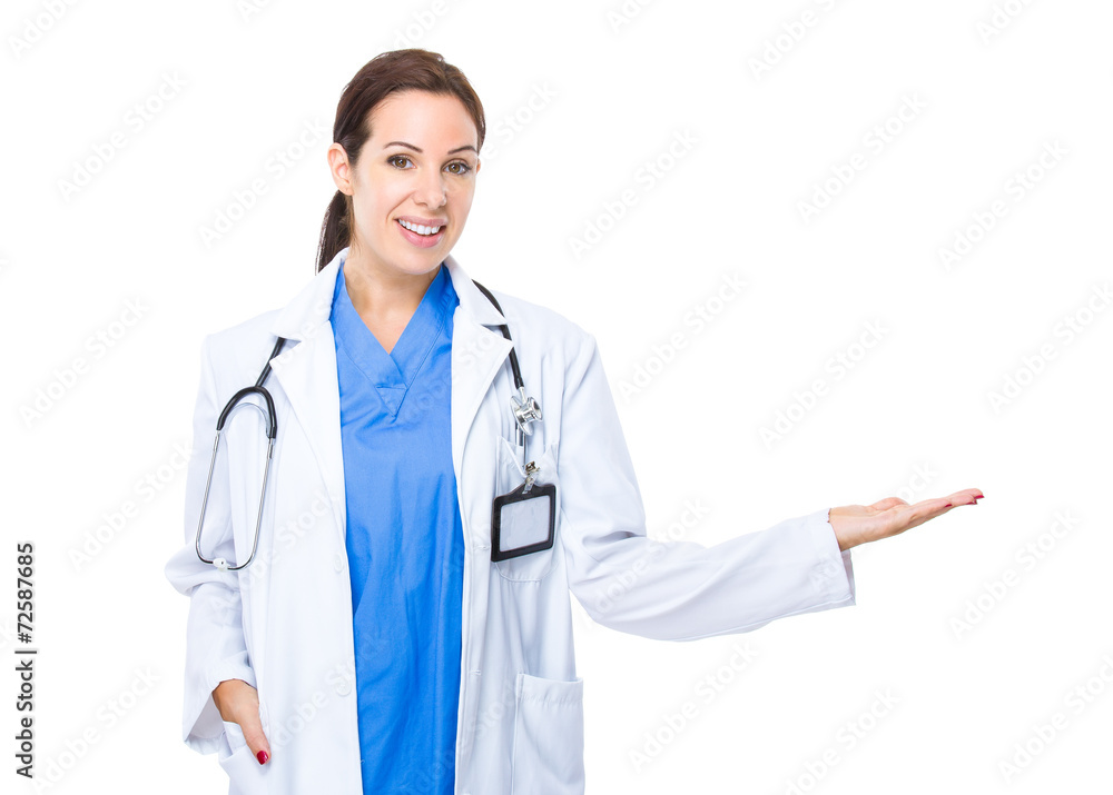 Female doctor show with open hand palm Female doctor show with open hand palm