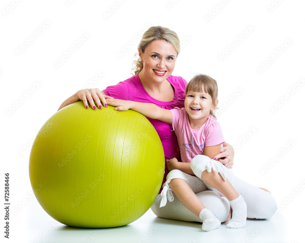 kid and mother with fitness ball kid and mother with fitness ball