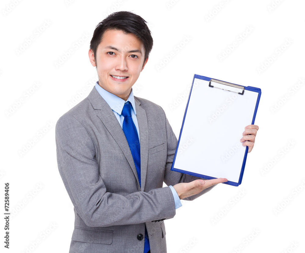 Businessman show with white paper on clipboard Businessman show with white paper on clipboard