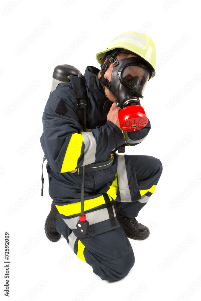 Naklejka premium Fireman in uniform isolated in white