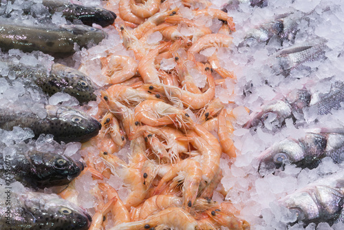 Shrimps and fish on ice