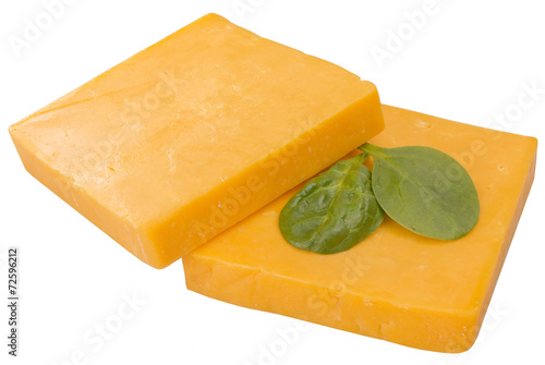 two slices of cheddar decorated with arugula isolated