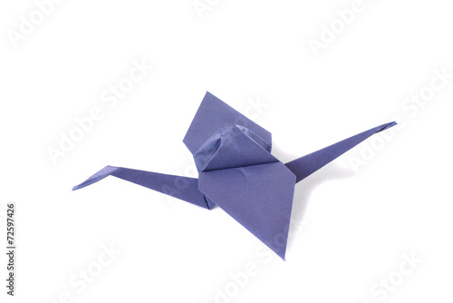 Origami crane over white
