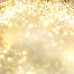 Christmas gold background. Golden holiday glowing background