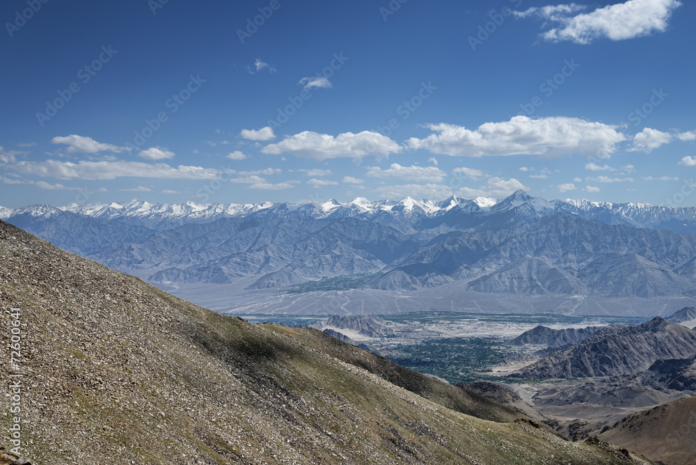 View of green leh valley and majestic range of Himalayas