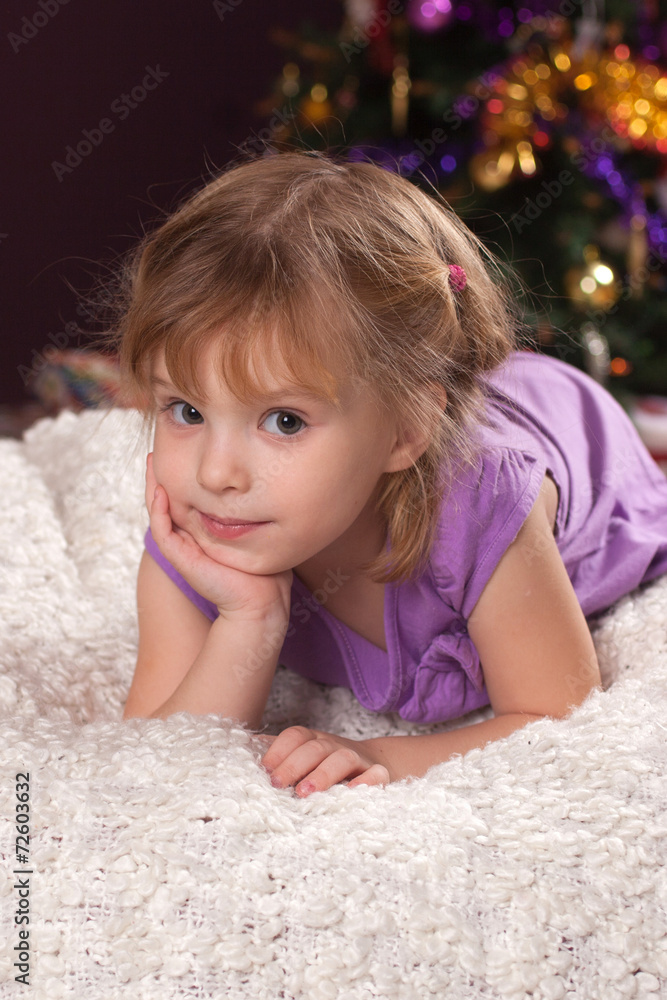 nice girl at a New Year tree