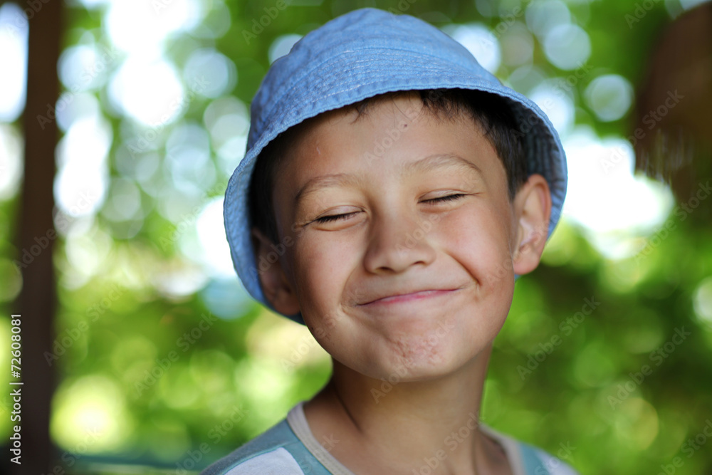 smiling happy boy in hat outdoors smiling happy boy in hat outdoors