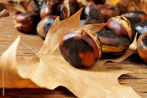 roasted chestnuts and autumn leaves photo