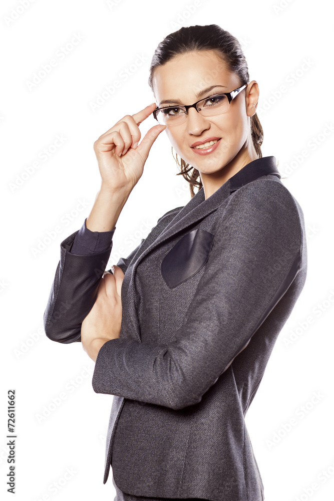 Happy business woman posing with arms folded Happy business woman posing with arms folded