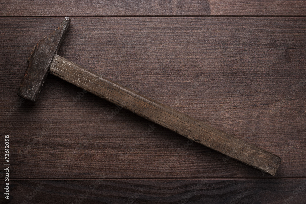 old rusty hammer on the table old rusty hammer on the table