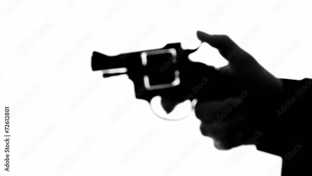 man shooting a handgun,real time,isolated,studio lighting man shooting a handgun,real time,isolated,studio lighting