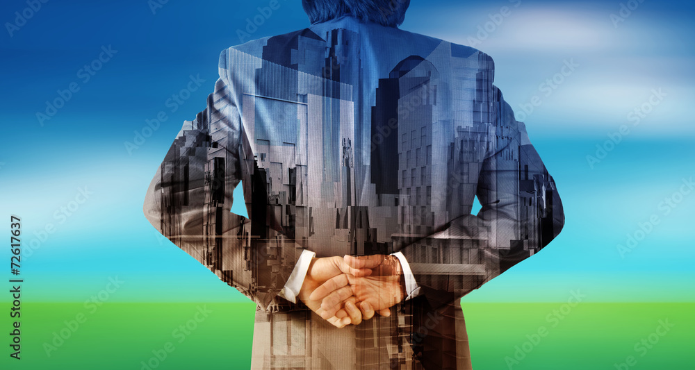 Double exposure of businessman and abstract city Double exposure of businessman and abstract city