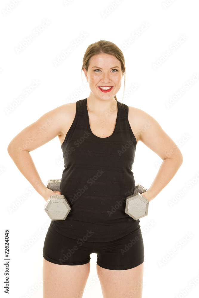 woman fitness black tank weights on hips woman fitness black tank weights on hips
