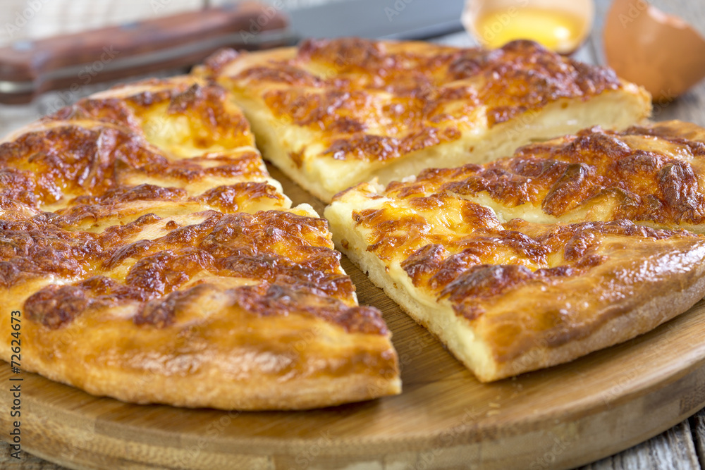 Slices of pie with cheese closeup.