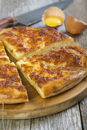 Slices of pie with cheese.