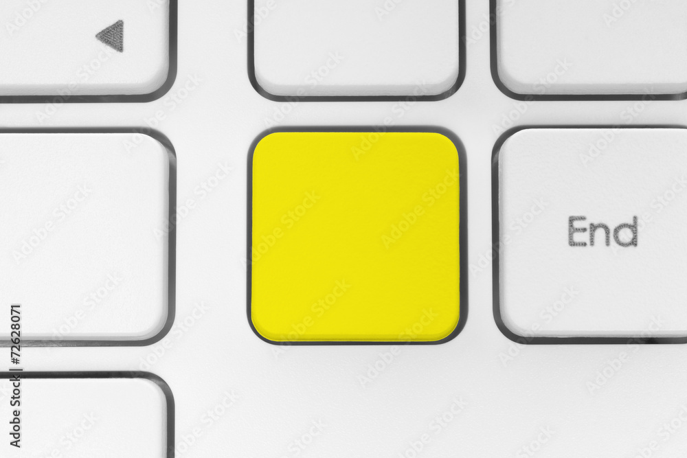 Blank yellow button on the keyboard. Blank yellow button on the keyboard.