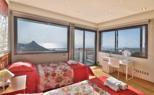bedroom in the modern villa with sea view photo