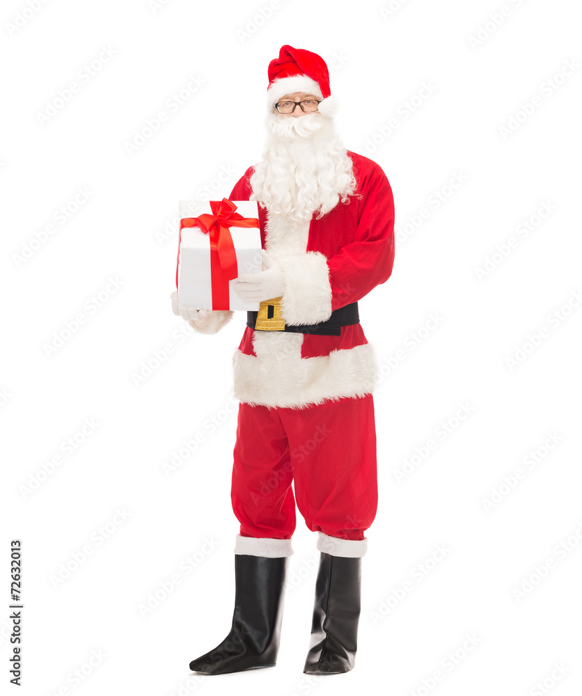 man in costume of santa claus with gift box man in costume of santa claus with gift box