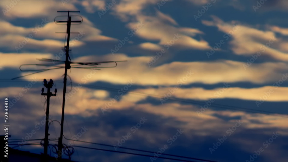 silhouette of TV antenna against the background of a sunset silhouette of TV antenna against the background of a sunset